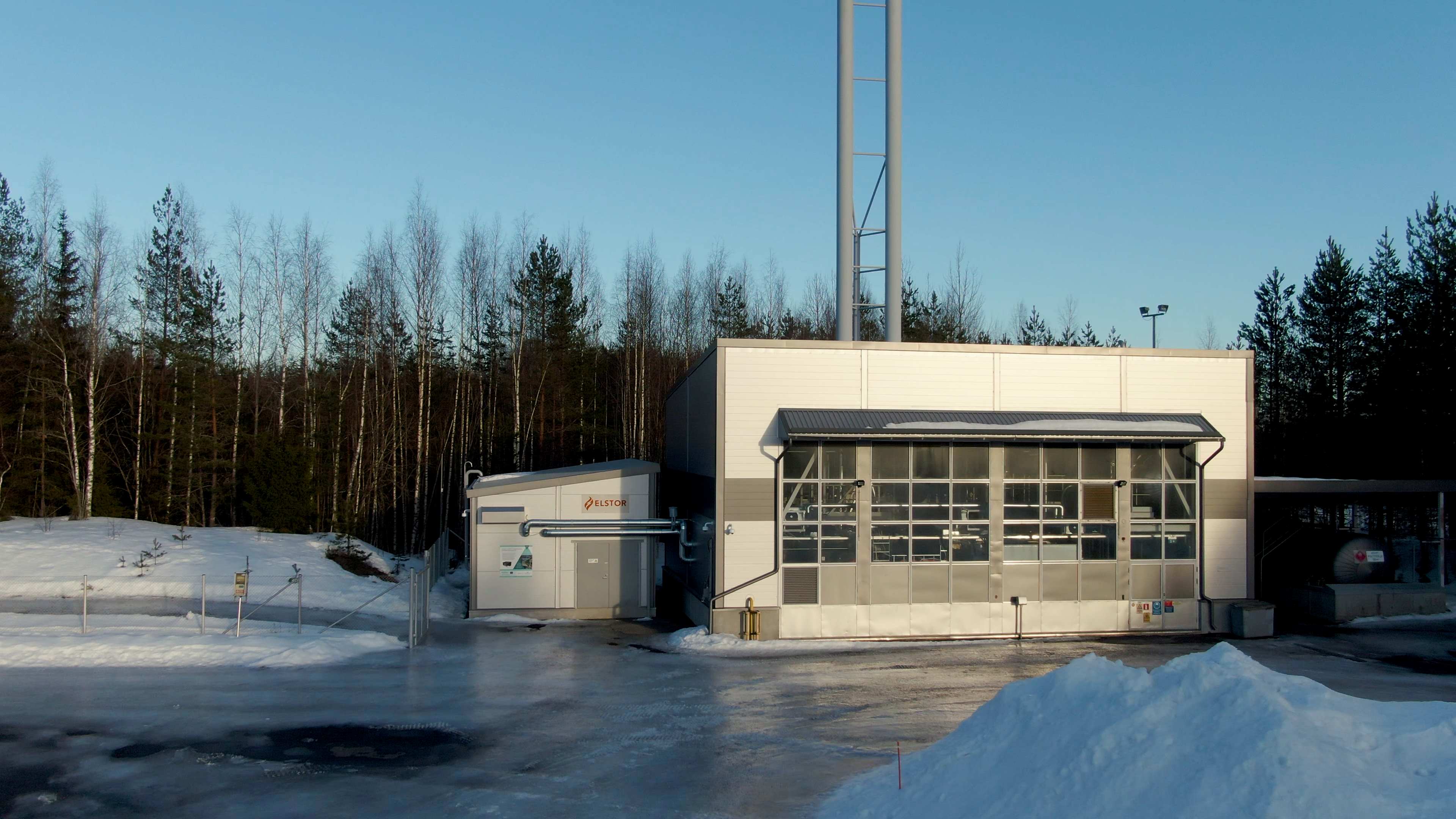 Thermal battery building photographed on a snowy winter day.